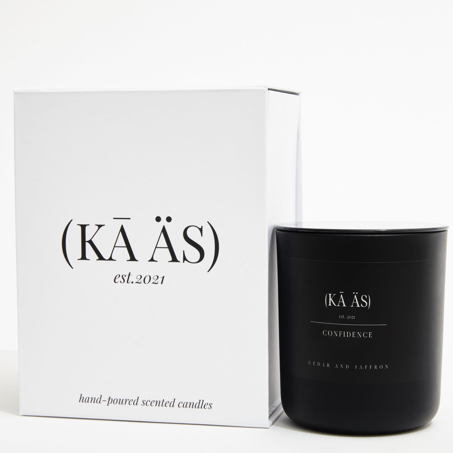 Cedar and saffron in a matte black vessel. confidence scented candle